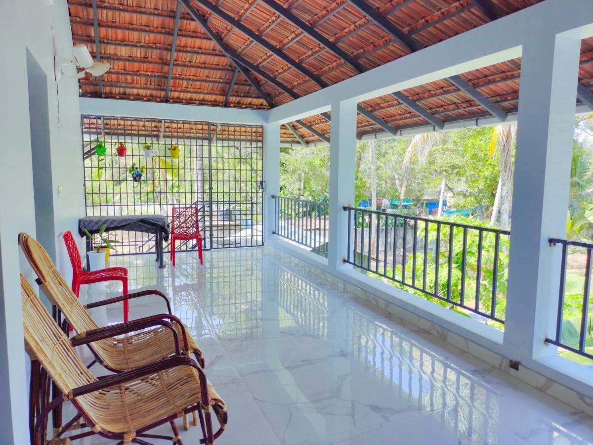 Malhar Marari Homestay Марарикулам Екстериор снимка